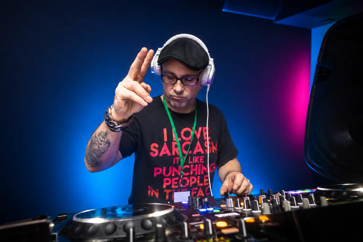 Groove Blender performing behind the DJ decks